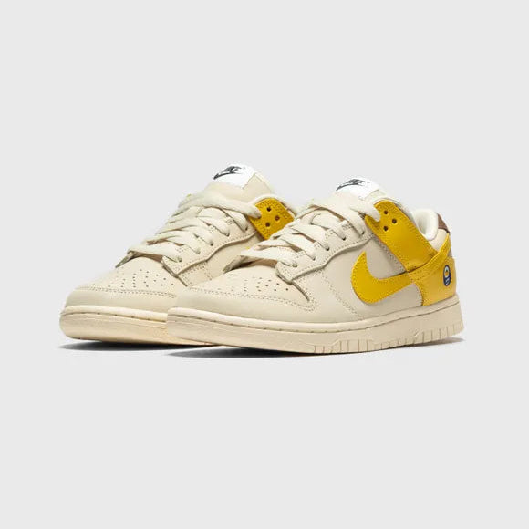 Pantofi sport Nike Dunk Low LX Banana bej cu detalii galbene și design modern pentru bărbați și femei