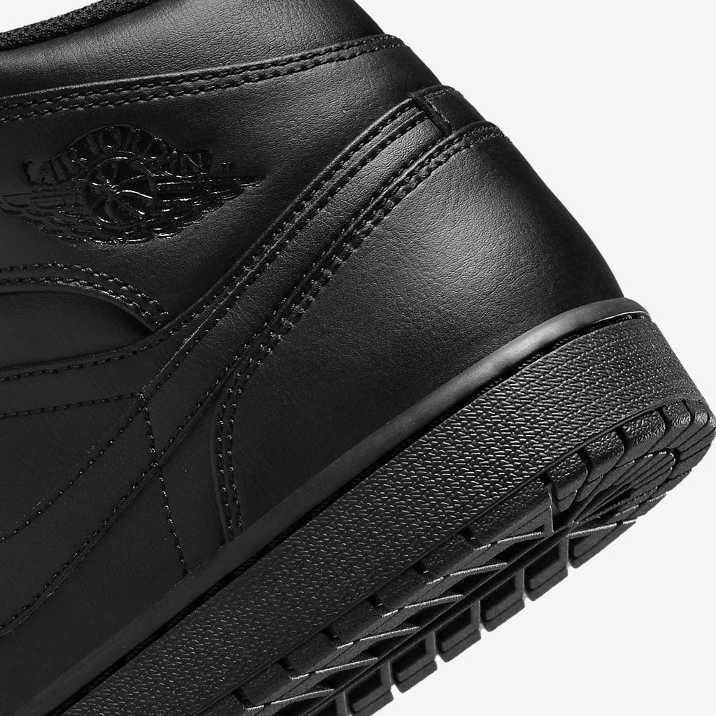 Air Jordan 1 Mid “Triple Black” 554724-093
