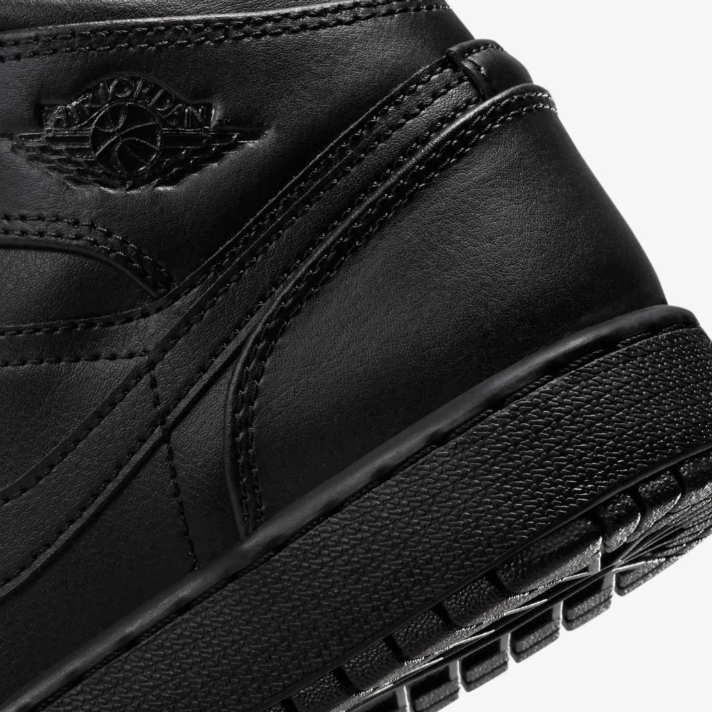 Air Jordan 1 Mid “Triple Black” 554725-093